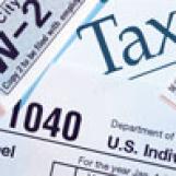 Collage of income tax-related forms