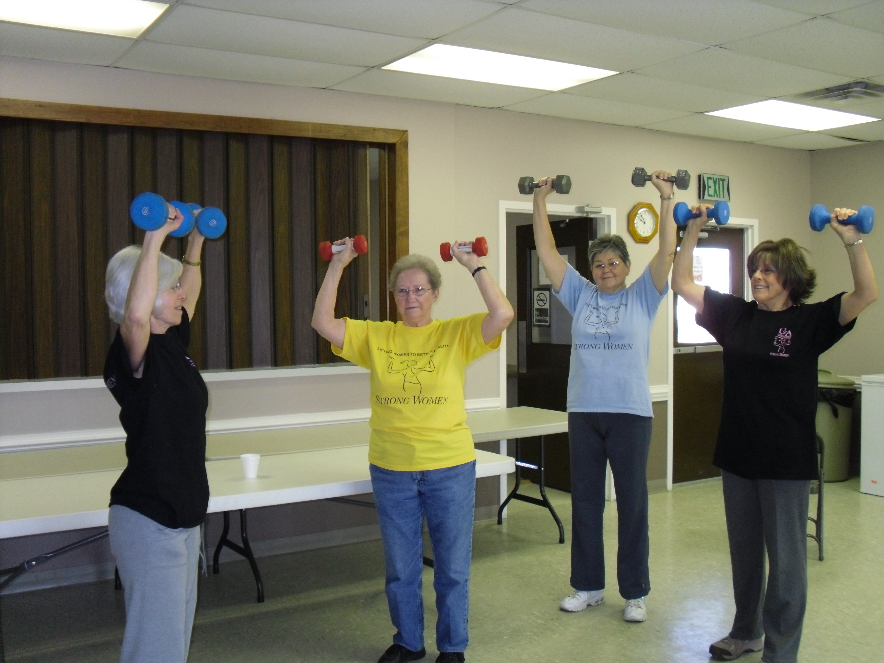 Picture of Strong Women participants lifting hand weights