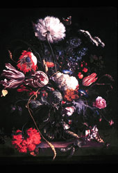Picture of a painting with and arrangement of tulips.