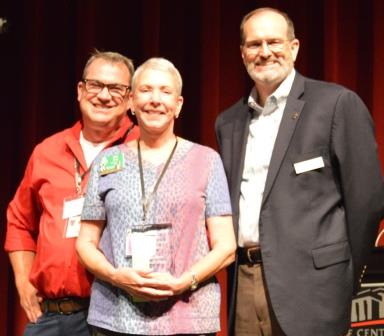 Judy Dare receiving Master Gardener of the Year Award from Randy Forst and Dr. Bob Scott