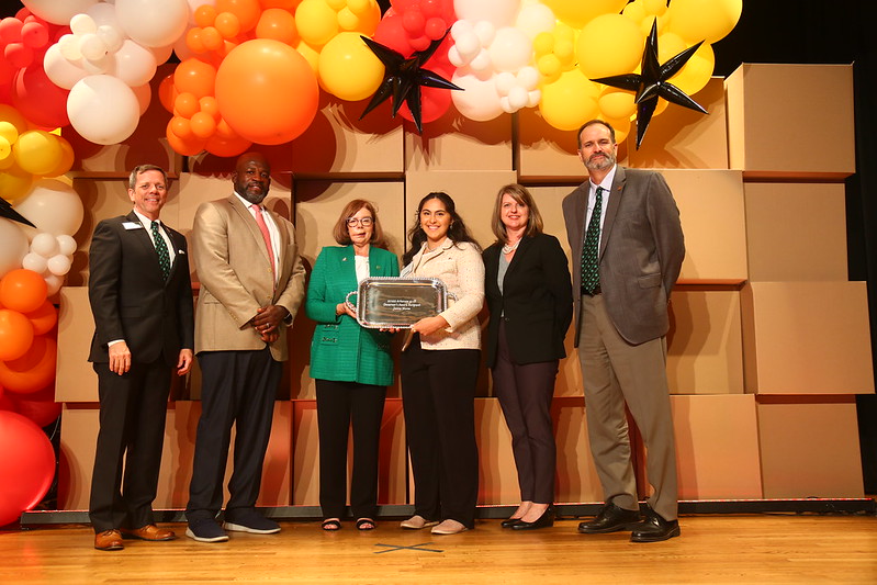 Division of Ag, 4-H Foundation officials flank governor's Award winner