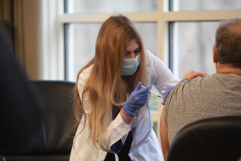 Person getting COVID vaccine