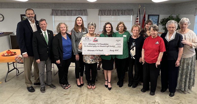 Members of the Brady EHC posing with a large check