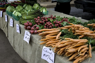 farmers-markets Photo of carrots, radishes, asparagus on a table