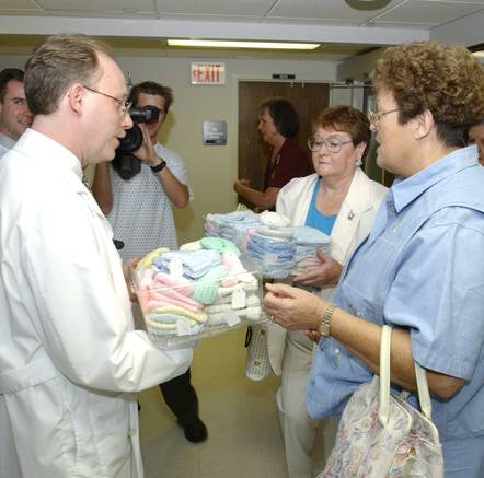 EHC volunteers donate infant caps to arkansas children's hospital doctor