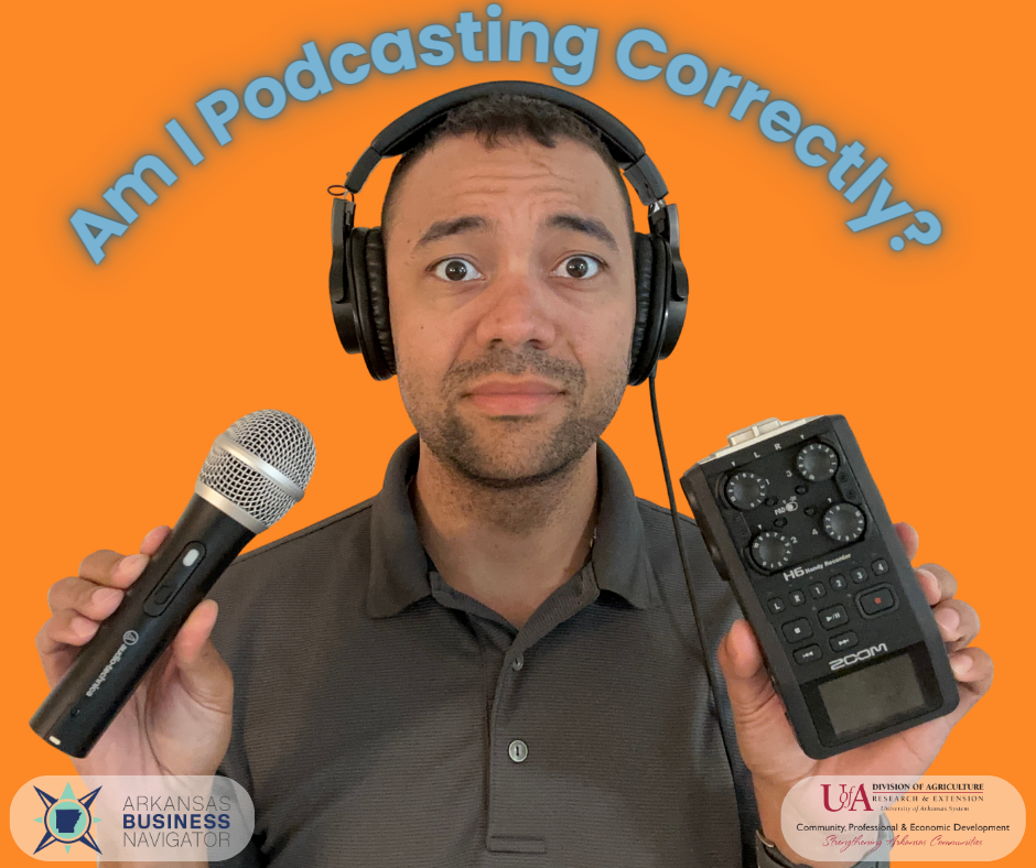 Brandon L. Mathews holding podcast equipment
