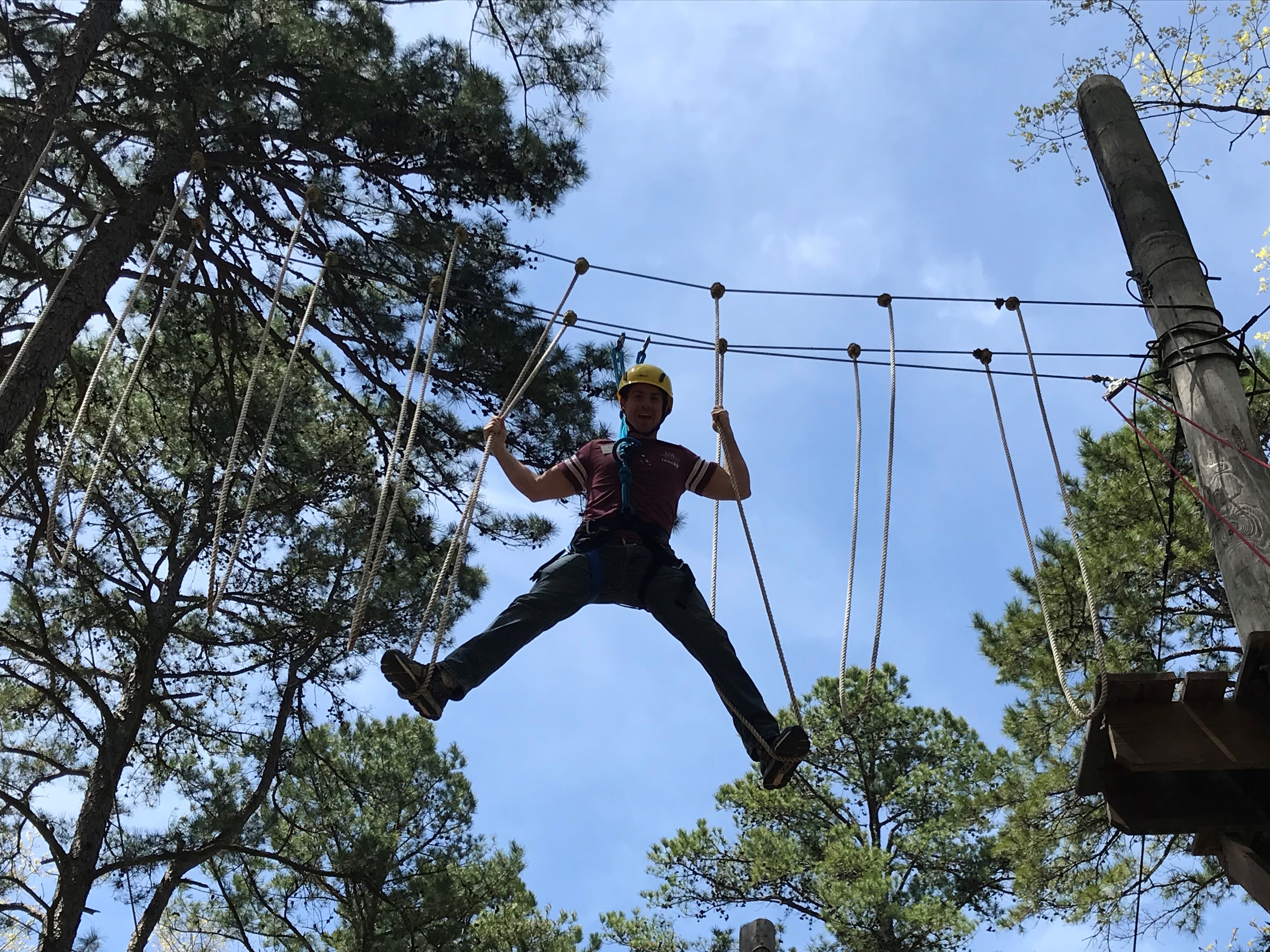 Class 18 participant Chris Wasson on the C.A. Vines Arkansas 4-H Center's ExCEL ropes course.