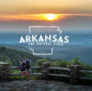 Arkansas state tourism logo with sun setting in the background