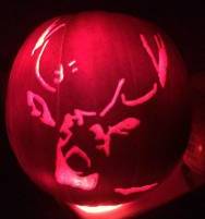 Buck portrait carved into pumpkin