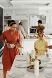 Family Setting the Table for Dinner By August de Richelieu from Pexels