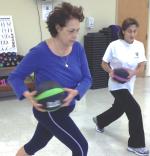 Women exercising with medicine balls