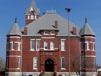 Burnt red brick 4 story building