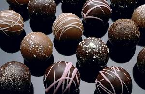 Variety of chocolate bon bons on a plate