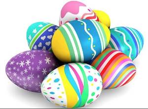 Seven decorated Easter eggs in bright colors of blue, yellow, pink, green, and purple.