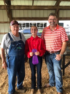 Makaelynn W. Grand Champion Poultry Chain Pen