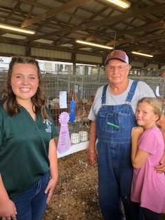 Kacey T. Reserve Champion Poultry Chain Pen