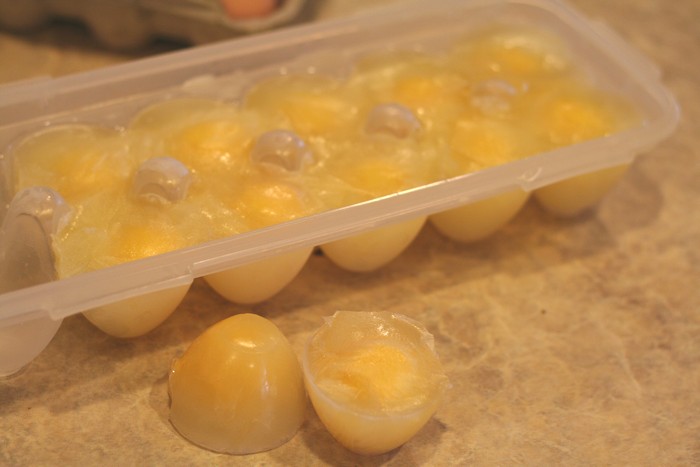 frozen eggs in ice cube tray