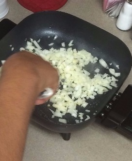 cooking minced garlic and onions