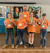 Photo: Poinsett County 4-H Shooting Sports team members and their coach receive awards at State Range Event.