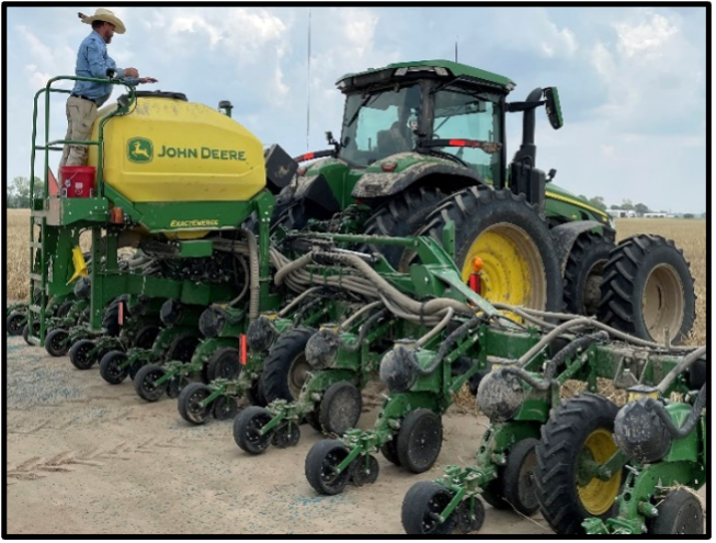 Agents work in the field with producers to solve problems.
