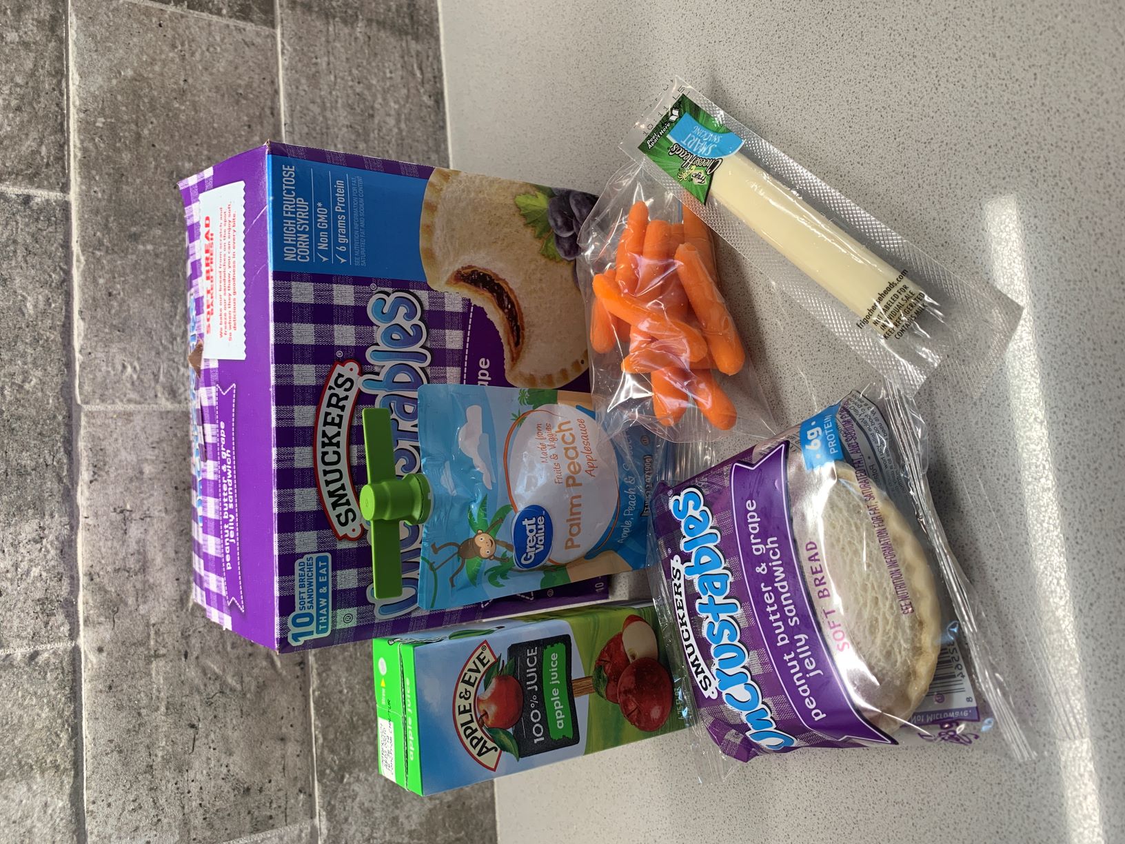 quick lunch idea with lunchable, carrots, applesauce, juice