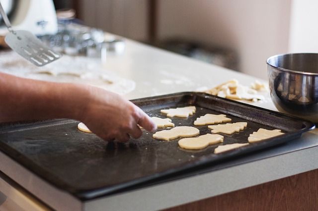 cut out cookie dough on a baking pan