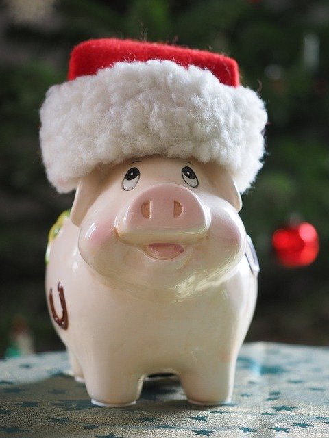 piggy bank with a Santa hat