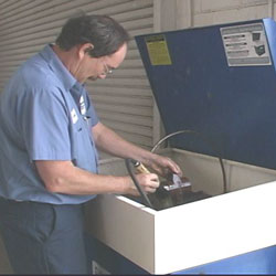 Worker cleaning parts