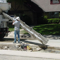 highway worker laying cement