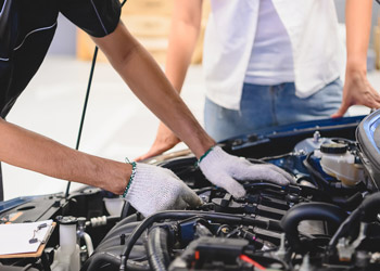 mechanic working on car