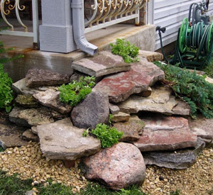 7. Direct Downspouts Away From Paved Surfaces