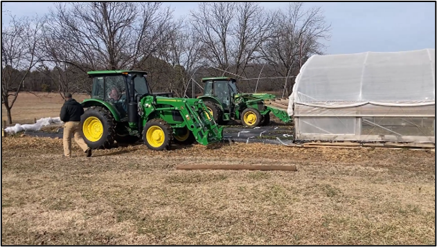 Tractor moving high tunnel