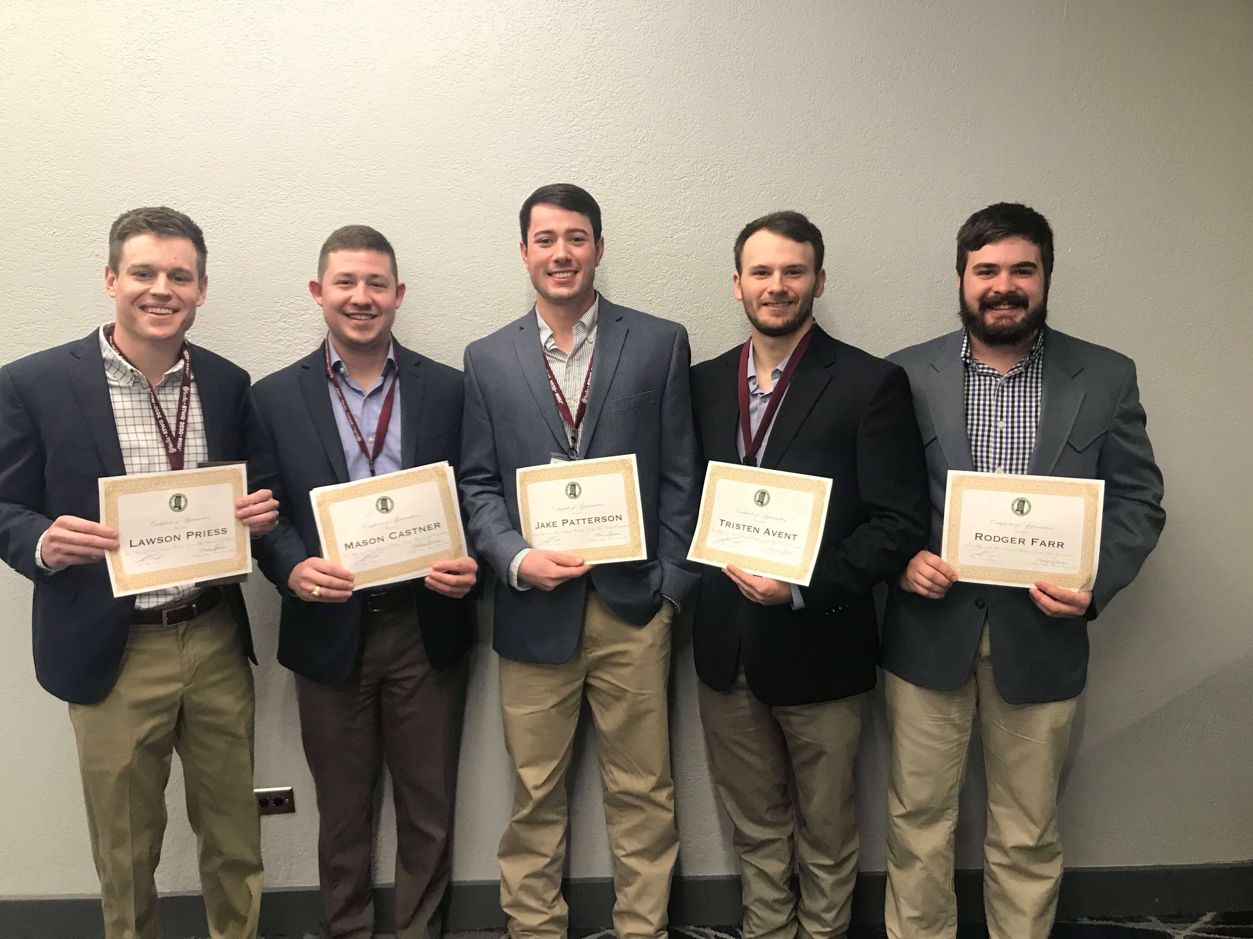 Group photo with Lawson and award certificate