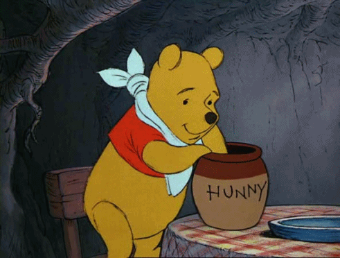 Winnie-the-Pooh eating Honey