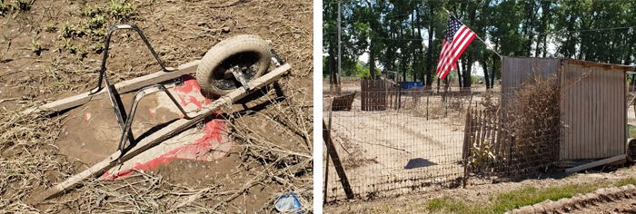 wheelbarrow buried in mud and American flag still flying