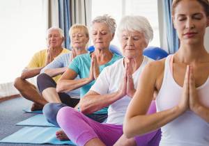 different ages of people meditating