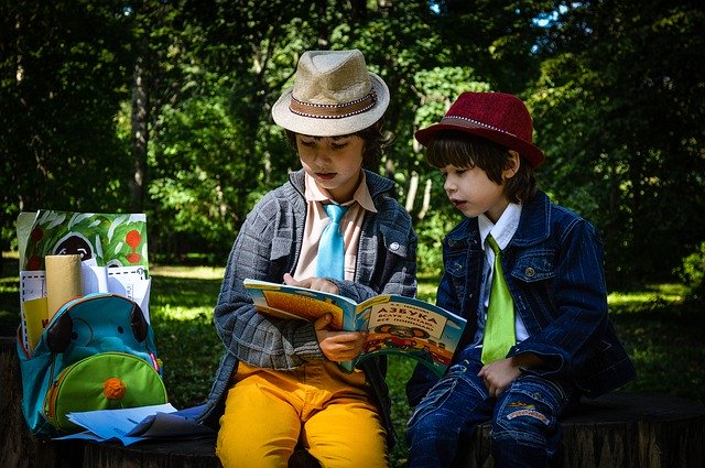 kids reading outside