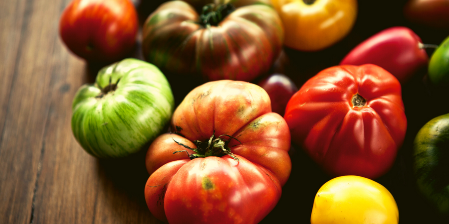 varieties of tomatoes on countertop
