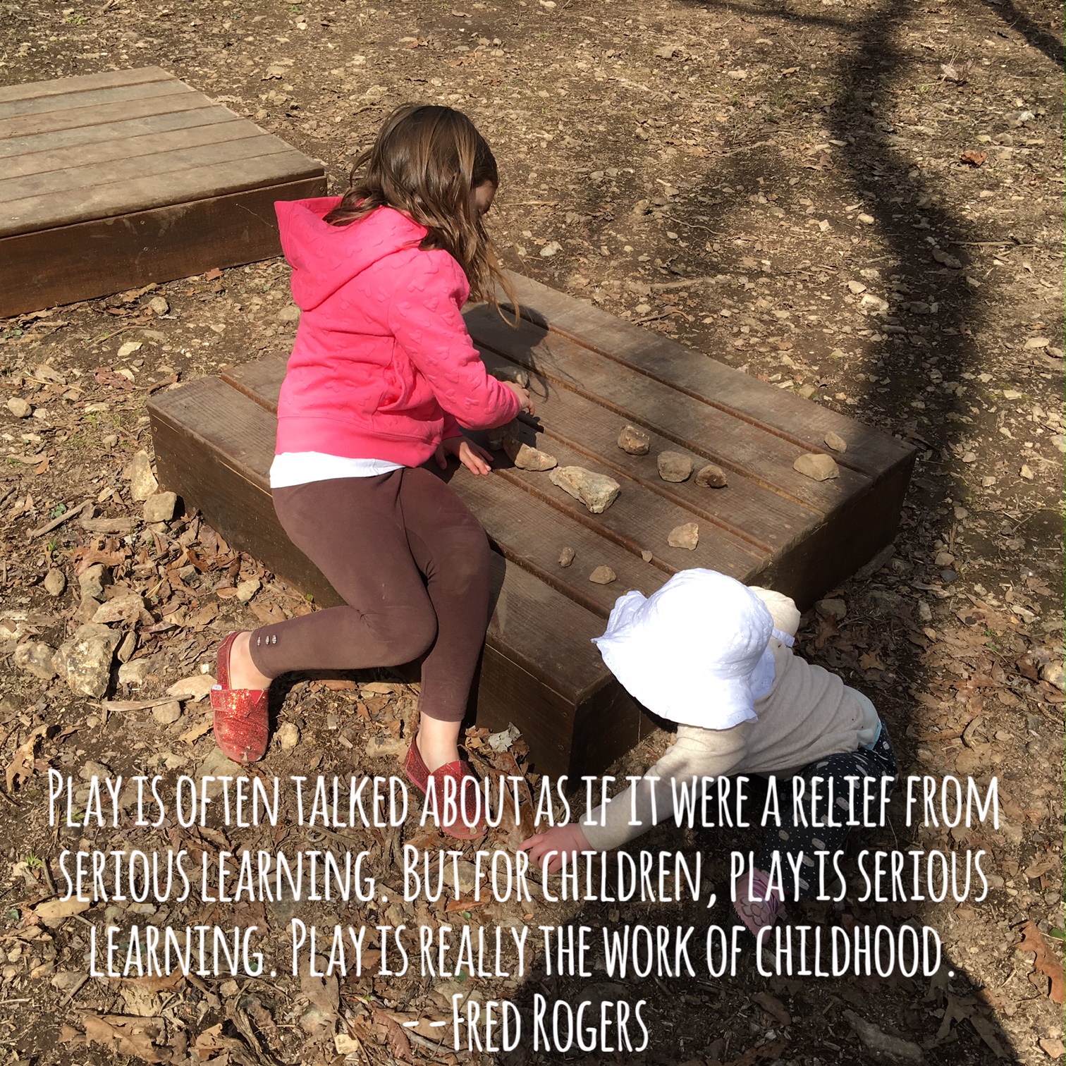 Text on image of a child sitting at an outdoor table "Play is often talked about as if it were a relief from serious learning. But for children, play is serious learning. Play is really the work of childhood. --Fred Rogers" 