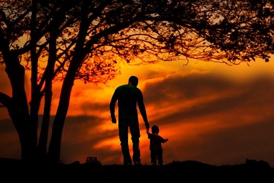 Father and child walking