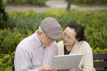 Elderly couple with laptop
