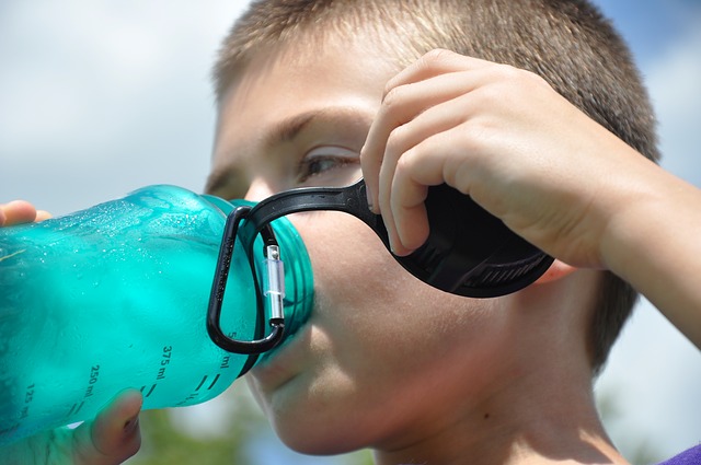 picture of a boy drinking water