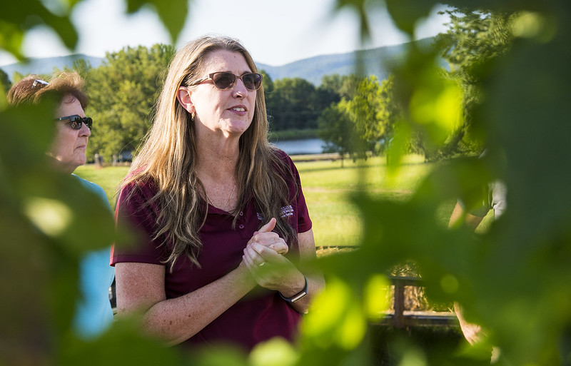 Renee Threlfall in a vineyard