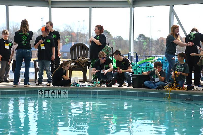 Competitors at the 2020 SeaPerch contest run their submersibles in the pool. 
