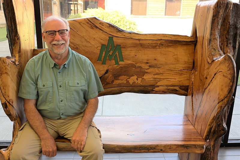 Phil Tappe on a bench