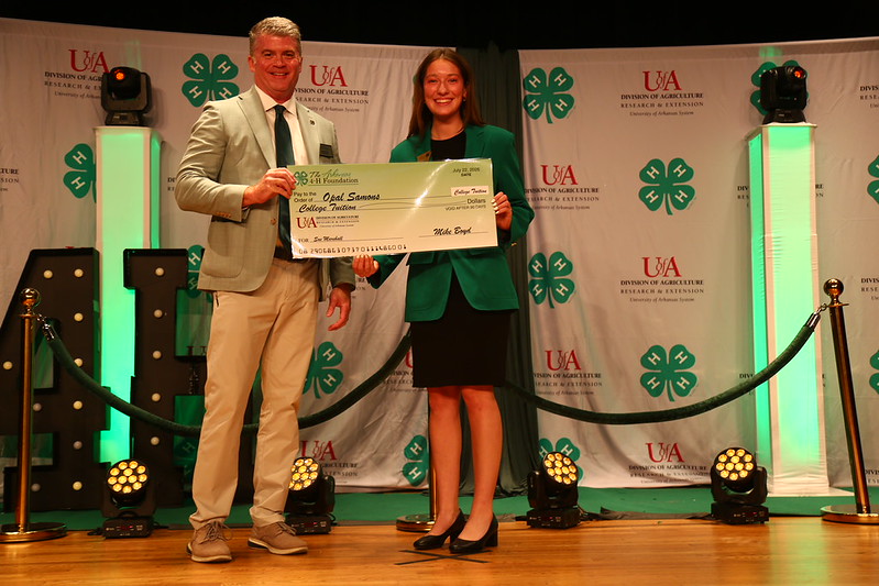 sue_marshall_scholarship_winner.jpg Mike Boyd presents 4-H member Opal Samons with the 2026 Sue Marshall Scholarship.