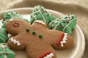 smiling gingerbread man cookie on a plate