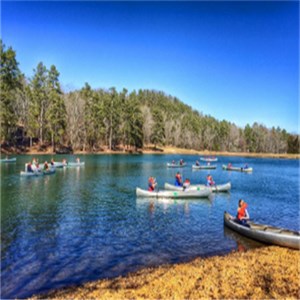 Canoes in lake at Vine Center, Arkansas
