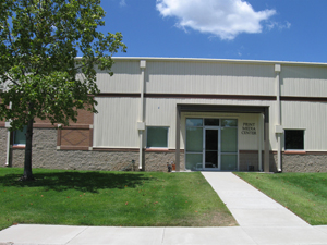 Image of the front of the print services building on a sunny day