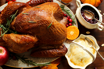 Roasted whole turkey with side dishes